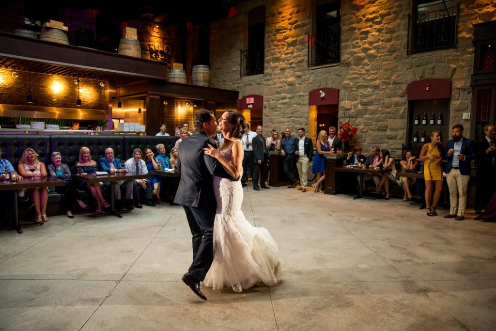 a photograph of a bride and groom dancing at Murrietas in Calgary
