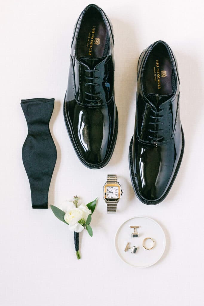 Layflat shoe detail photograph of groom items